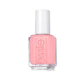 Essie nail polish displays a soft, baby pink color in its clear glass bottle with a white cap.
