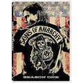 See the "Sons of Anarchy Season One" DVD cover displaying a biker with the Grim Reaper logo against an American flag backdrop.
