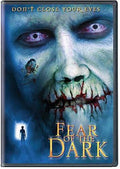 The "Fear of the Dark" horror movie DVD cover features a decaying, blue-tinged zombie face with bloodshot eyes and bloody teeth, warning "Don't Close Your Eyes."
