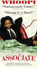 Whoopi Goldberg, as seen on the movie poster for "The Associate," relaxes atop stacks of cash while wearing a suit and red boots.
