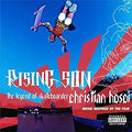 Skateboarder Christian Hosoi performs a mid-air trick against a blue sky on the "Rising Son" movie soundtrack cover.
