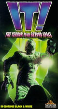 Movie poster advertises the classic sci-fi horror film "It! The Terror from Beyond Space," showing a green-skinned alien monster.
