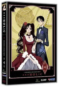 Showcases the XXXHOLiC anime DVD box set, featuring a formal anime couple in front of a golden rose.

