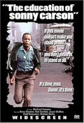 "The Education of Sonny Carson" movie poster shows a Black man running intensely through a city street.
