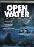 "Open Water" DVD cover features a couple swimming in the ocean as a shark fin approaches, hinting at the true-events thriller movie.
