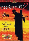 The "Jeepers Creepers 2" movie poster depicts the Creeper silhouetted against a fiery sky, impaled on a makeshift cross as a crow flies nearby, emphasizing the horror film's tagline: "He can taste your fear."
