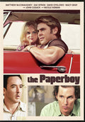 "The Paperboy" movie poster features Zac Efron and Nicole Kidman riding in a red convertible, with inset photos of John Cusack and Matthew McConaughey.
