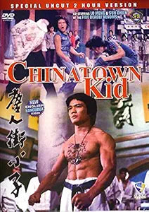 Promotional movie poster showcases "Chinatown Kid," a special uncut martial arts film featuring a shirtless, muscular actor.
