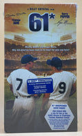 A vintage VHS tape promotes the Billy Crystal baseball movie "61*", featuring Mickey Mantle and Roger Maris, and advertises a sweepstakes for a fantasy baseball camp.

