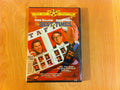 Close-up shows the DVD of "The Best of Times," starring Robin Williams and Kurt Russell, featuring a yearbook-style cover.