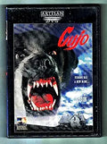 "The CuJo DVD cover shows a menacing, rabies-infected dog baring its teeth against a stormy background with a lone house."
