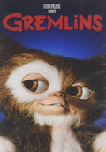 The "Gremlins" movie poster features a close-up of the furry creature Gizmo smiling innocently against a blue background.
