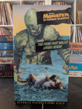 A vintage VHS tape cover for "The Monster of Piedras Blancas" depicts a sea creature looming over swimmers on a beach.
