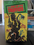 The Day of the Triffids VHS cover shows killer alien plants attacking people in a vintage science fiction horror movie scene.
