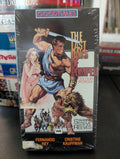 Steve Reeves battles a lion on a sealed VHS tape of "The Last Days of Pompeii" movie.

