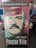 Viewers see a shrink-wrapped VHS tape of the movie "Pancho Villa," starring Telly Savalas and Chuck Connors, featuring a "Wanted!" poster image.

