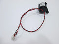 Black computer speaker shows connected red and black twisted wires with a white connector on a white background.
