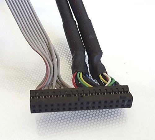 Computer connects using a ribbon cable and insulated wires with a black connector.
