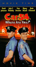 Two police officers stand back-to-back for the "Car 54, Where Are You?" movie poster.
