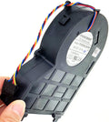 Hand holds a Foxconn DC brushless fan, model PVB120G12H-P01, with visible power connector and colorful wiring.
