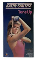 Kathy Smith demonstrates a tone-up exercise with a resistance band on the vintage workout VHS cover.
