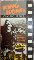 King Kong carries Fay Wray above the city skyline on the vintage movie cover.
