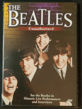 The Beatles smile on the cover of their "Unauthorized" DVD featuring historic live performances and interviews.
