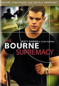 Matt Damon, as Jason Bourne, holds a gun on the movie poster for "The Bourne Supremacy" action film.
