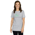 Woman smiles while wearing a gray t-shirt promoting healthy mental health awareness.
