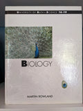 A University of Bath Biology textbook features a vibrant peacock displaying its feathers.
